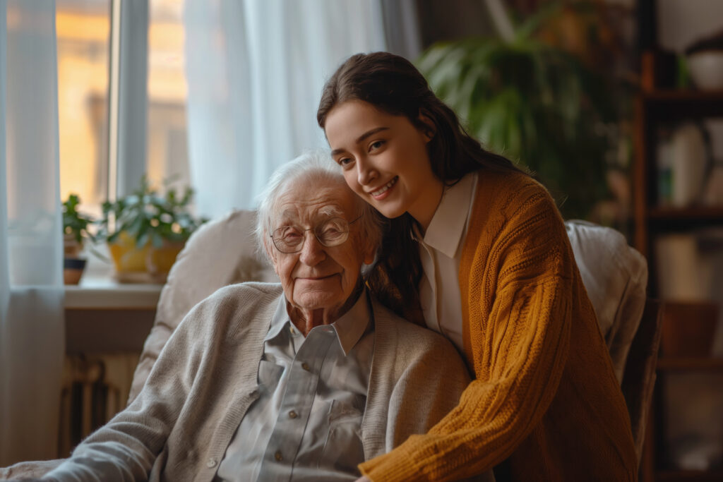 Older adult smiling with family, showing emotional resilience and support during an important life transition.