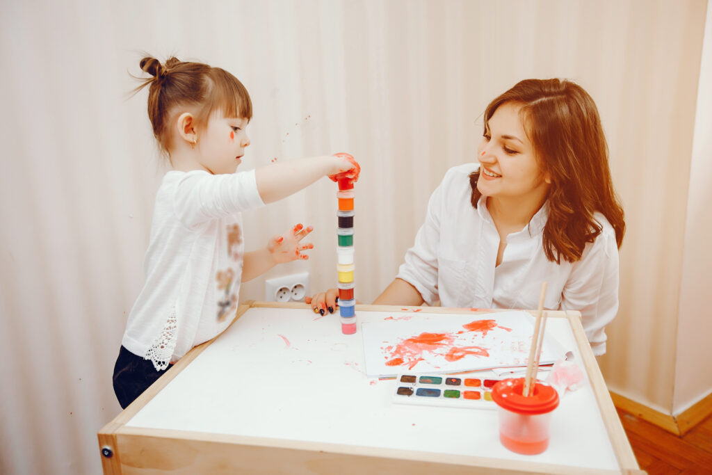 Child engaged in play therapy session during modern child counseling at a leading NGO in India.