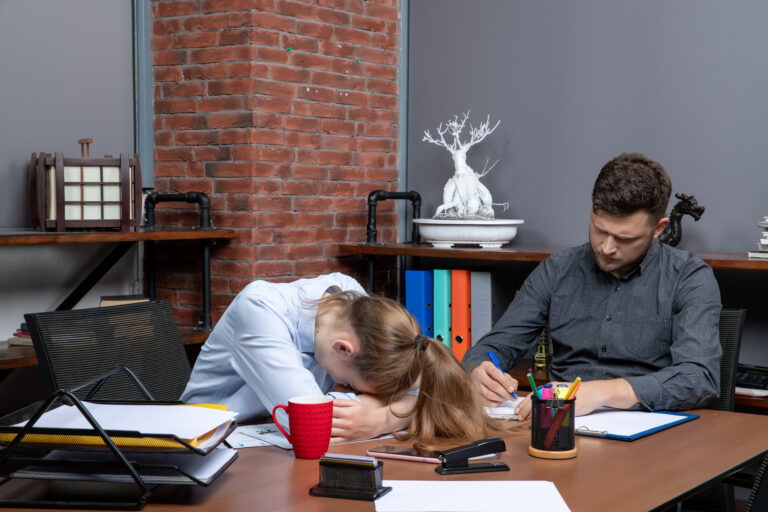 Comparison of emotional burnout and physical fatigue showing mental exhaustion versus body tiredness with different recovery needs.