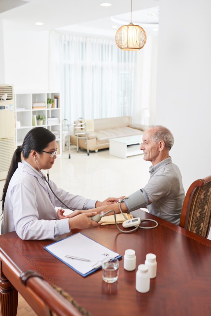 Elderly woman talking with a counsellor during a supportive geriatric counselling session