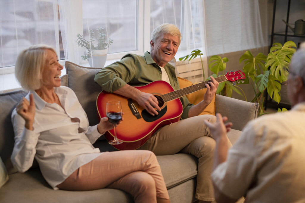 Smiling older adults enjoying an active lifestyle outdoors, representing healthy ageing and positive ageing.