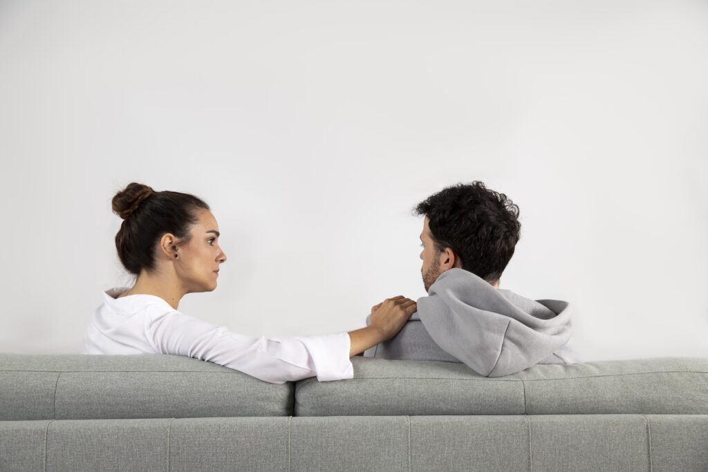 Person reflecting on emotional dependency vs healthy attachment, illustrating secure relationships and emotional balance.