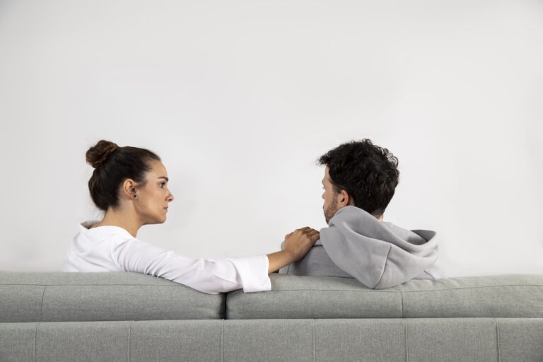 Person reflecting on emotional dependency vs healthy attachment, illustrating secure relationships and emotional balance.